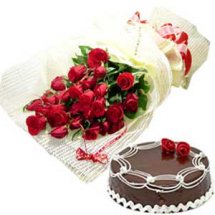 Black forest Cake along with 12 Lovely long stem Roses