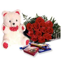 12 red roses bunch + teddy + 5 cadbury chocolates.